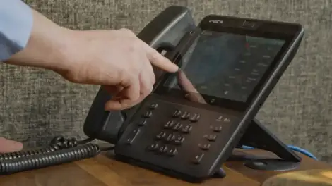 iPECS business handset in use